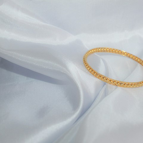 Brazalete rígido dorado